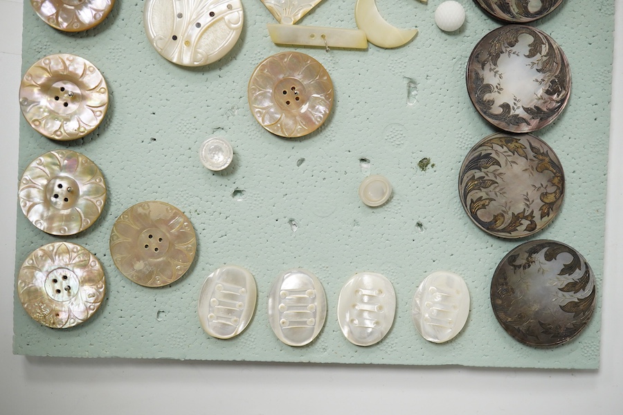 A collection of assorted Victorian and later mother of pearl buttons, largest 40mm. Condition - good